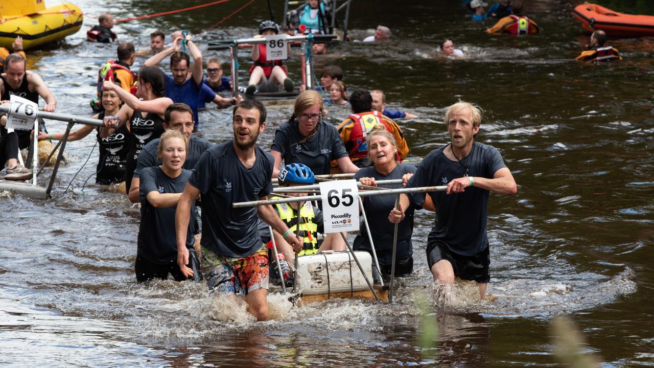 Team 65 &quot;Fountains Abbey and Brimham Rocks&quot; battle their way through the River Nidd crossing in 2022
